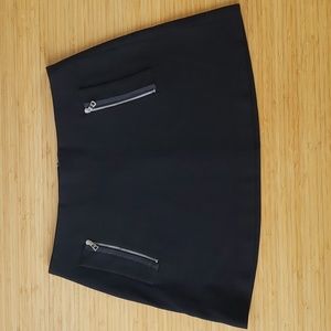 Black mini skirt w pockets & chrome metal silver zippers, quality tretchy fabric
